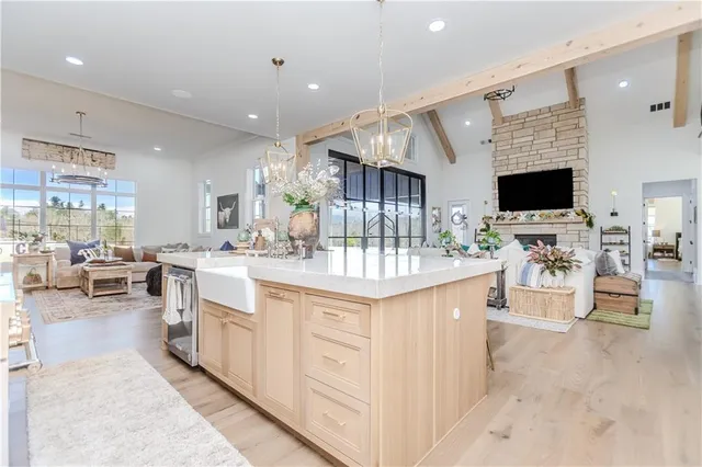 a kitchen with stainless steel appliances white cabinets and a stove