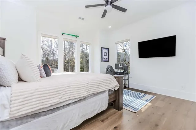 a view of a house with a snow on the road