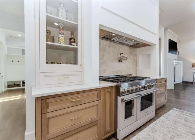 a living room with furniture fireplace and a flat screen tv
