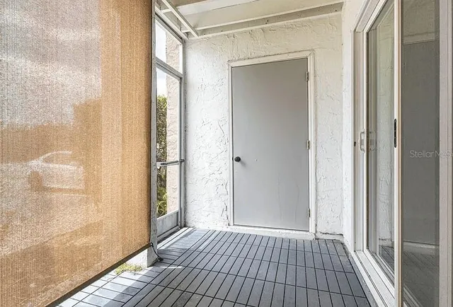 a view of a bathroom from a hallway