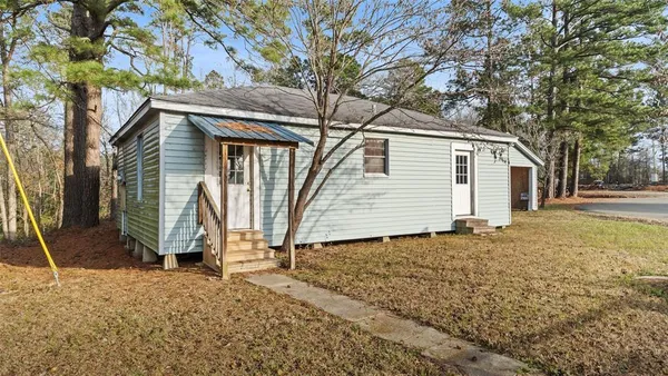 a view of livingroom with hardwood floor and hallway