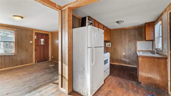 a bathroom with a shower and a sink