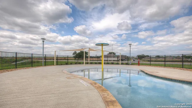 a view of outdoor space with swimming pool