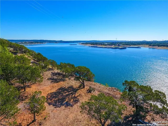 a view of a lake with a city view