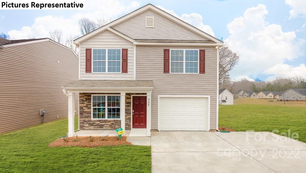 5022 Fandango Road York, SC 29745 - Photo 1 of 18 a front view of a house with a yard and garage