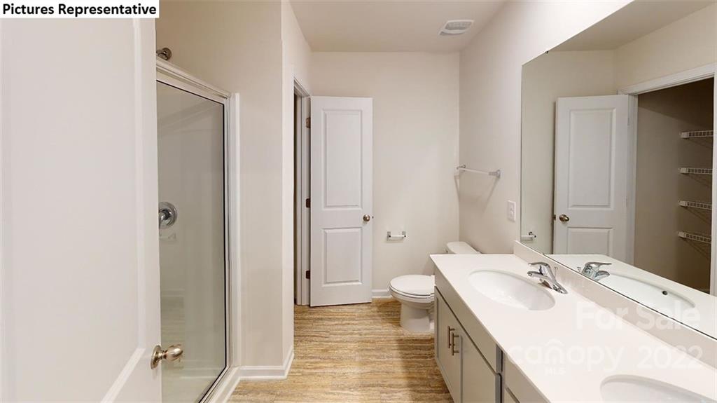 5022 Fandango Road York, SC 29745 - Photo 11 of 18 a bathroom with a sink and a mirror
