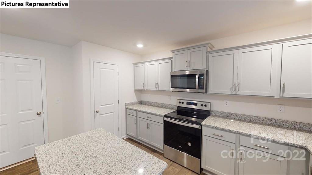 5022 Fandango Road York, SC 29745 - Photo 8 of 18 a kitchen with a sink and steel appliances