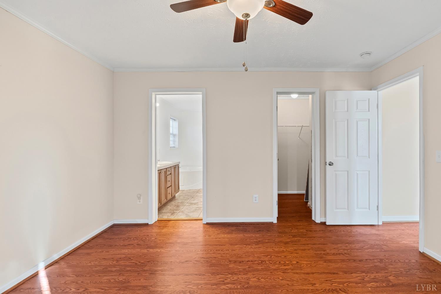 309 Marion Road Chatham, VA 24531 - Photo 11 of 27 a view of an empty room with window and wooden floor