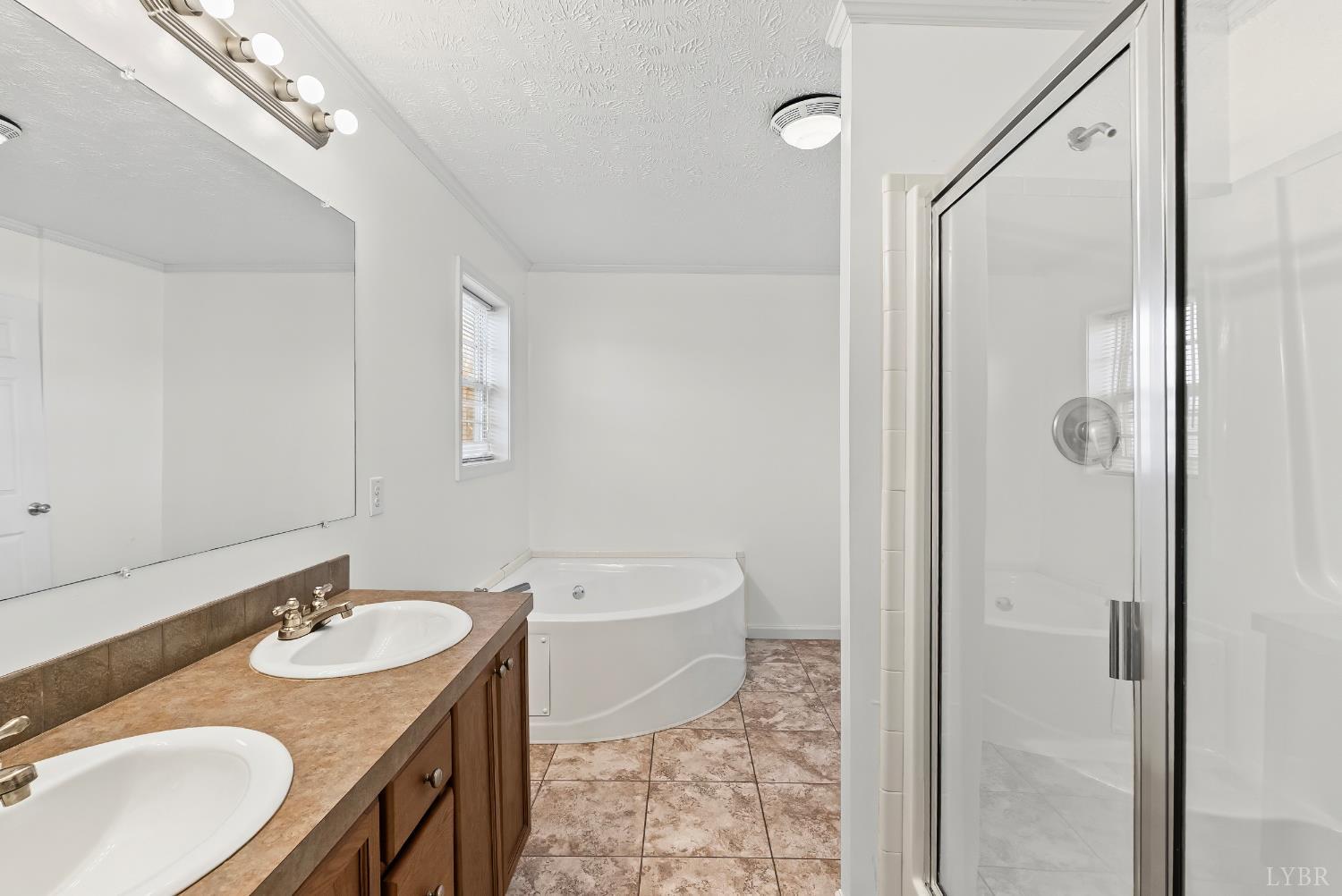 309 Marion Road Chatham, VA 24531 - Photo 12 of 27 a bathroom with a granite countertop sink toilet a mirror and shower