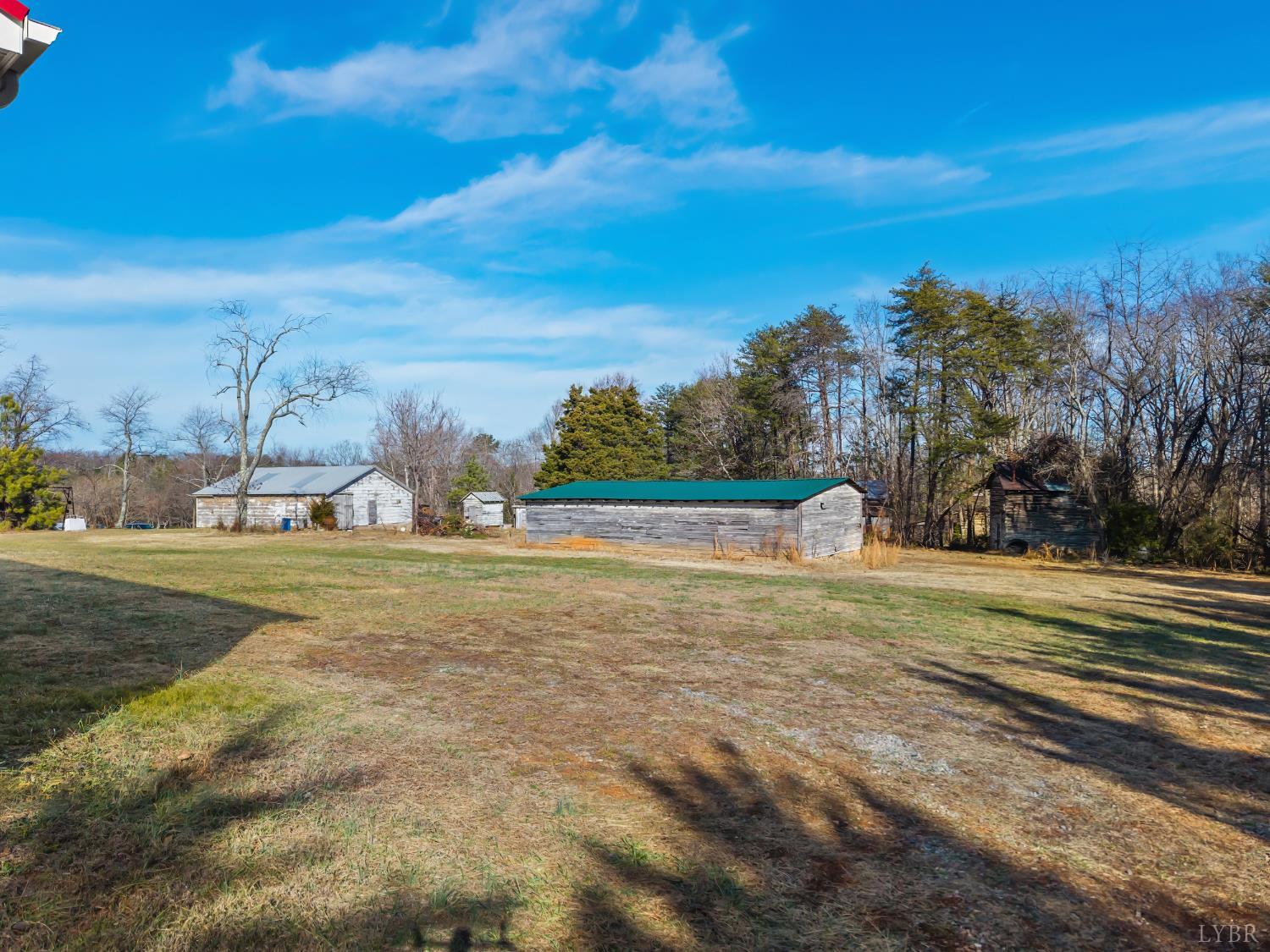 309 Marion Road Chatham, VA 24531 - Photo 17 of 27 a view of a field with an trees