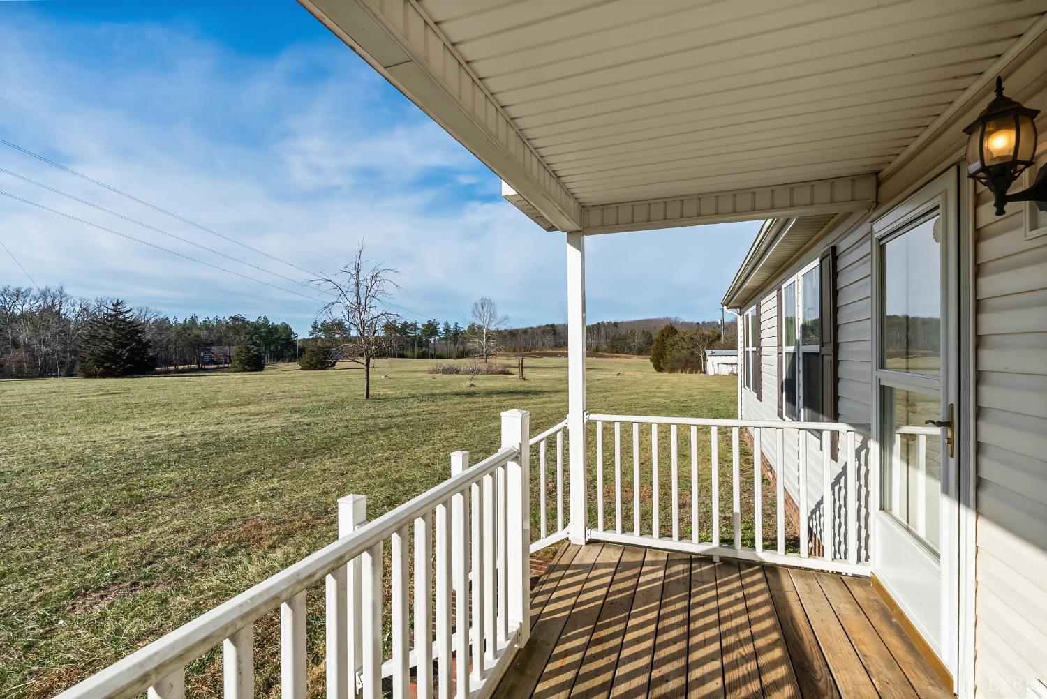309 Marion Road Chatham, VA 24531 - Photo 8 of 27 a view of a wooden deck with city view