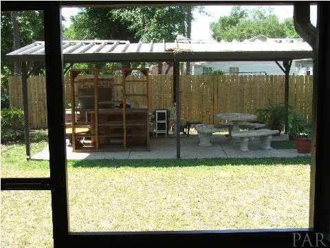 4839 Williams Road Pace, FL 32571 - Photo 6 of 17 ~ COVERED FULL MASONARY BBQ GRILL ~ CONCRETE PAD ~ METAL STRUCTURE ~ POSSIBLE BOAT SHELTER ~