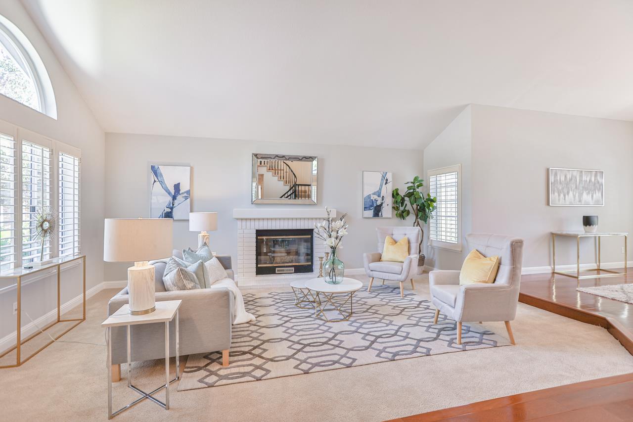 220 Rio Grande Court San Ramon, CA 94582 - Photo 5 of 33 a living room with furniture a fireplace and a table