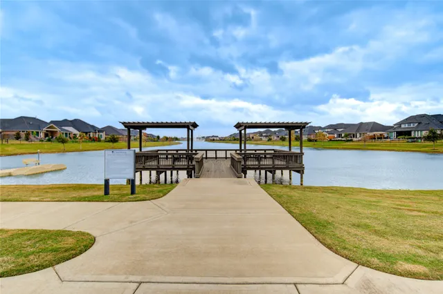 a view of a swimming pool with an ocean view