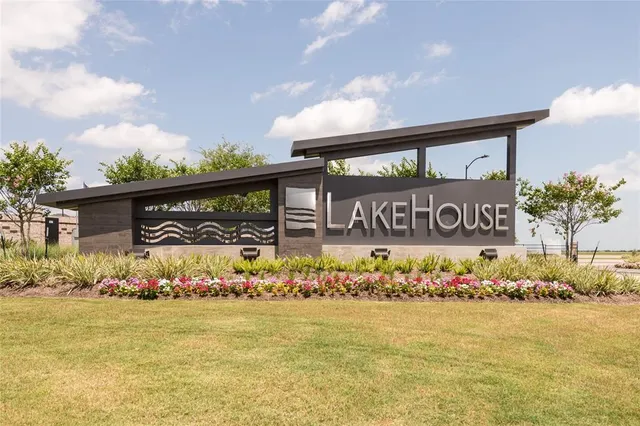 a street sign that is on a sidewalk