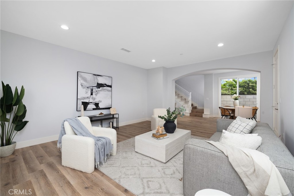 11237 Gladhill Road, Unit 6 Whittier, CA 90604 - Photo 7 of 34 a living room with furniture and a large window