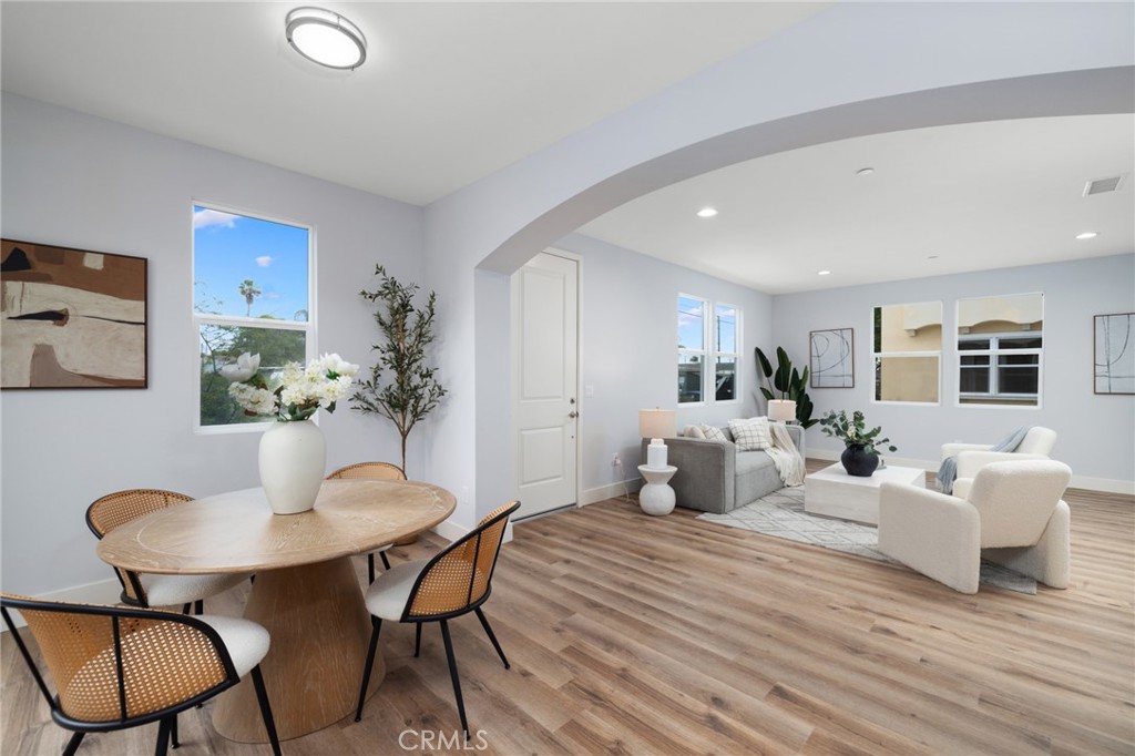 11237 Gladhill Road, Unit 6 Whittier, CA 90604 - Photo 10 of 34 a bedroom with furniture and wooden floor