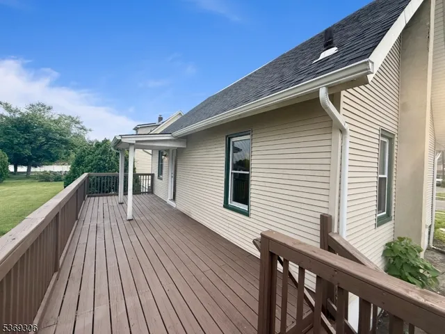 a view of yard with grass and a trees