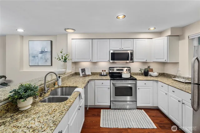 a bathroom with a sink and mirror