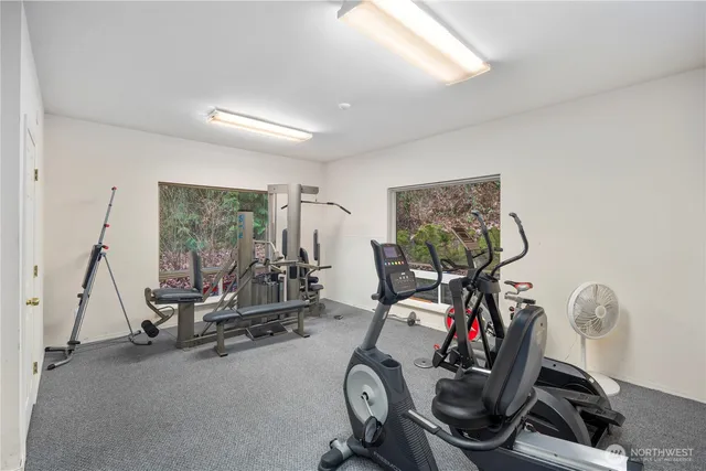 a view of a swimming pool with a yard