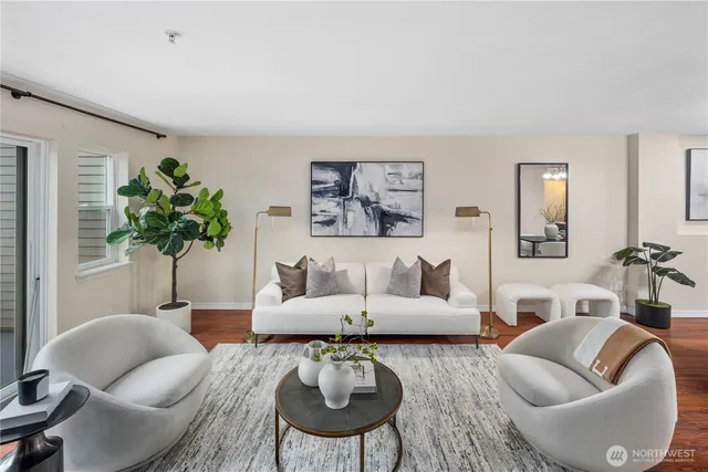 a view of a dining room with furniture wooden floor and chandelier