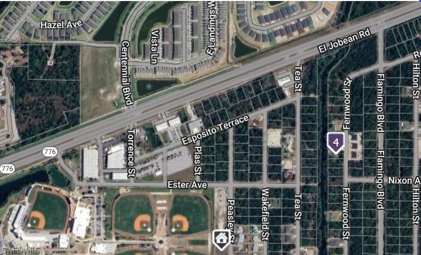 2048 El Jobean Road Port Charlotte, FL 33948 - Photo 3 of 6 a front view of a building with street