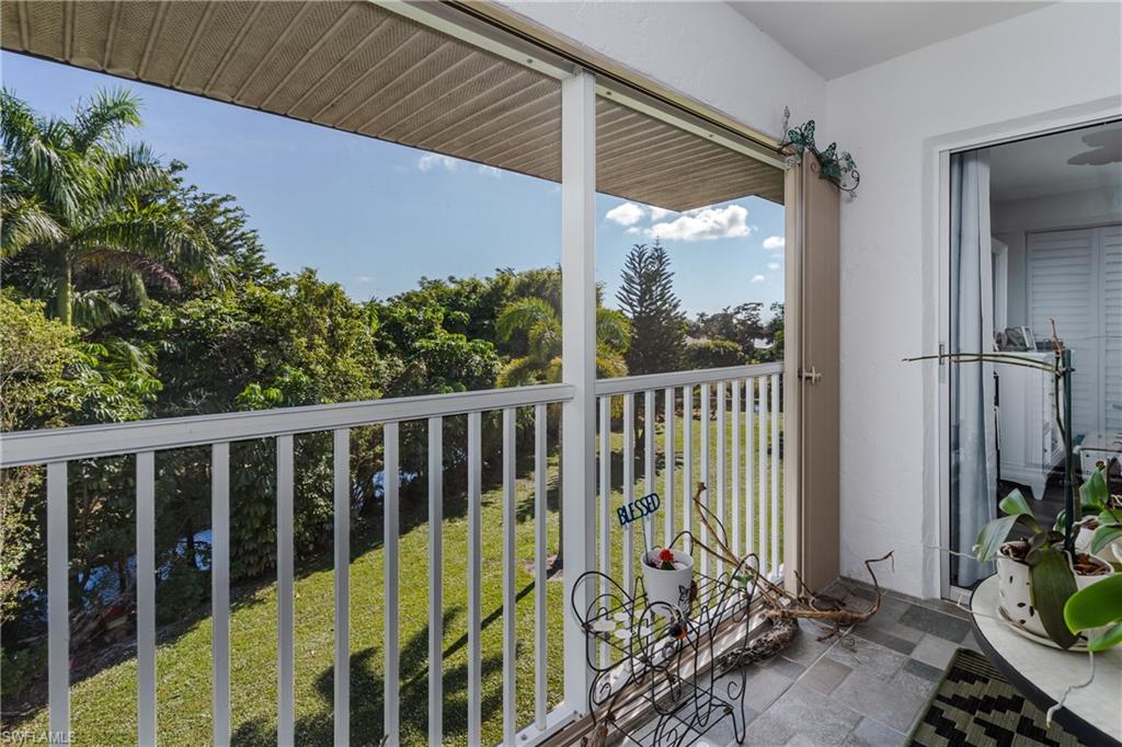 5499 Rattlesnake Hamm Road, Unit 304A Naples, FL 34113 - Photo 3 of 30 a view of a porch