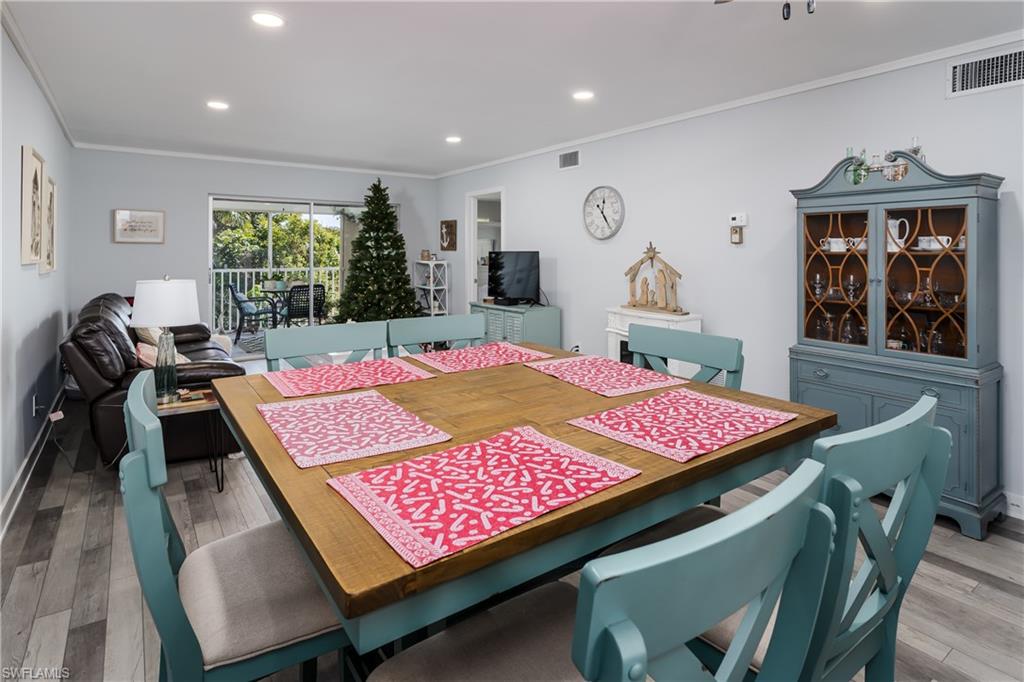 5499 Rattlesnake Hamm Road, Unit 304A Naples, FL 34113 - Photo 9 of 30 a bed room with a bed and a window