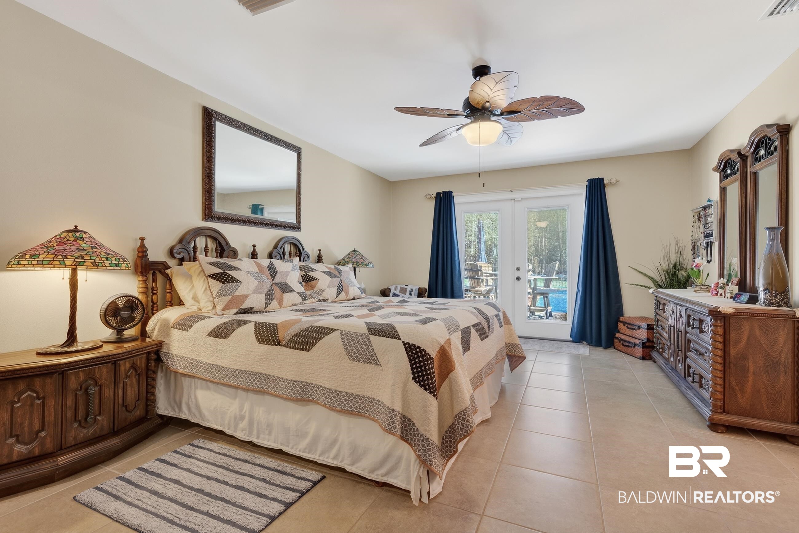 1271 Spring Valley Drive South Mobile, AL 36693 - Photo 32 of 56 Bedroom featuring french doors, access to exterior, light tile patterned floors, and a ceiling fan