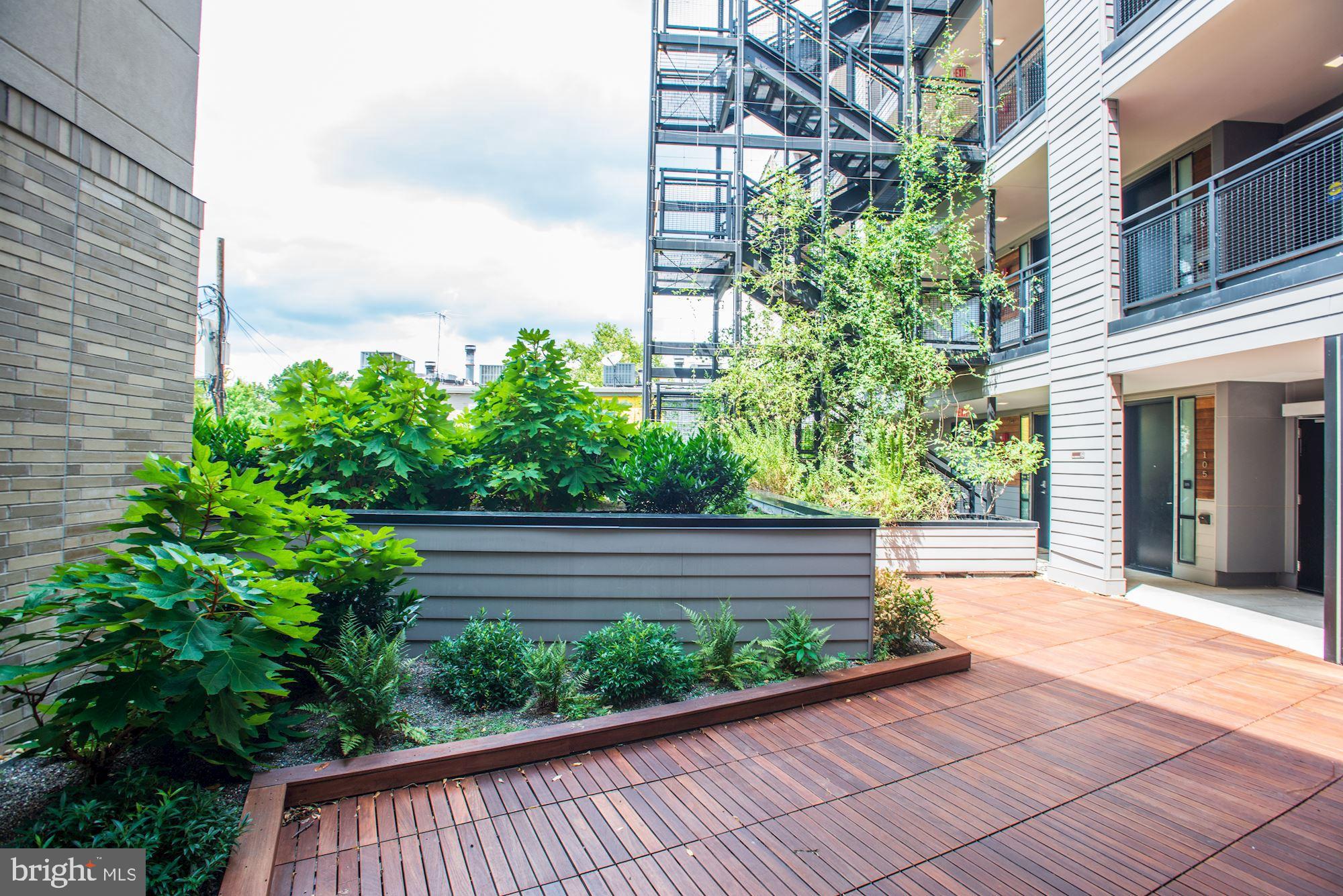 1550 11th Street Northwest, Unit 203 Washington, DC 20005 - Photo 16 of 21 Ipe Decking Throughout Outdoor Common Areas