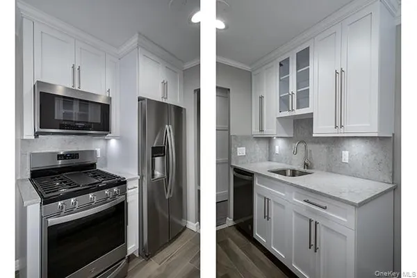 a kitchen with stainless steel appliances a stove a sink and a refrigerator