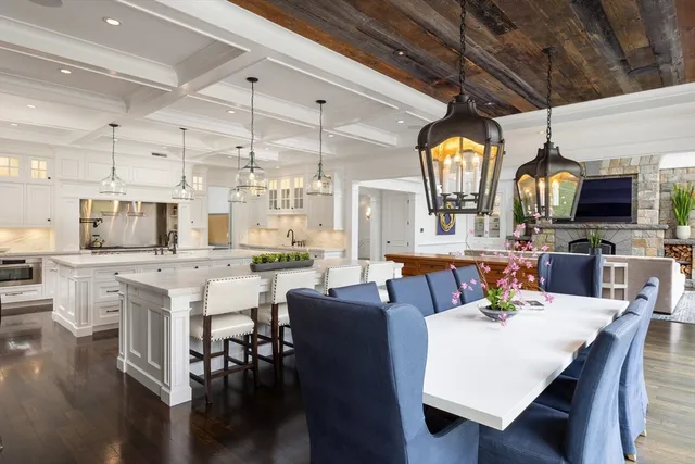 a view of a dining area with furniture and wooden floor
