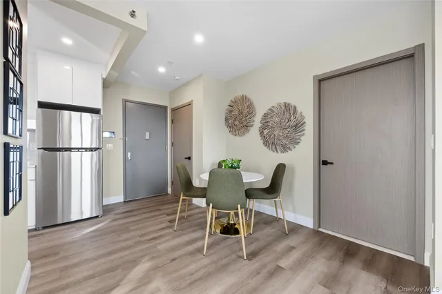 a workspace with furniture and wooden floor