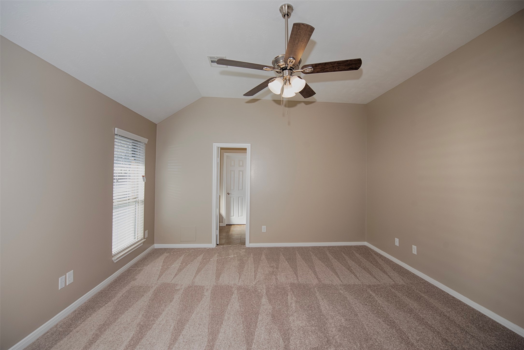 6714 Lone Star Ridge Manvel, TX 77578 - Photo 19 of 37 wooden floor in an empty room with a window