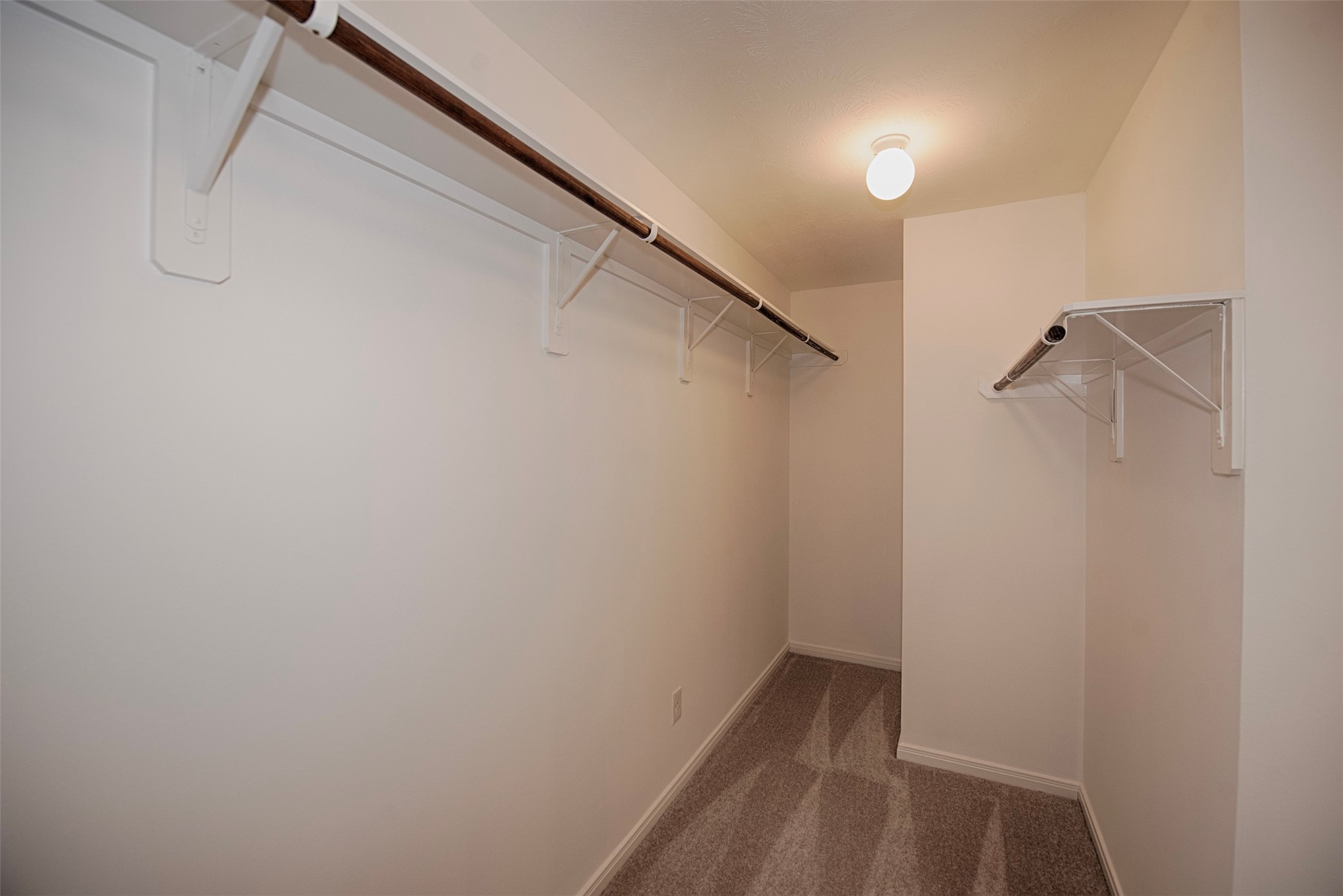 6714 Lone Star Ridge Manvel, TX 77578 - Photo 25 of 37 a view of small space with racks on the wall