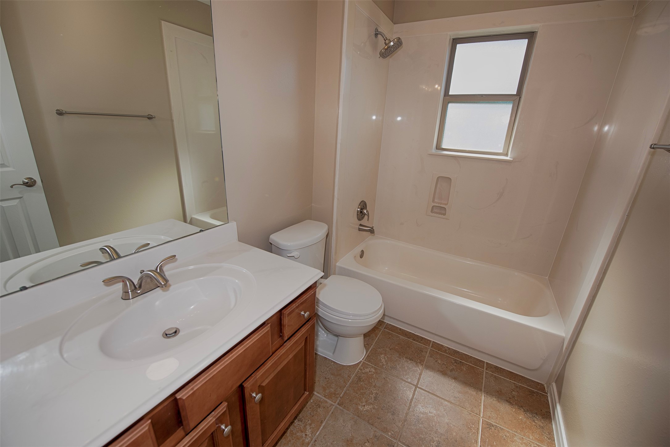 6714 Lone Star Ridge Manvel, TX 77578 - Photo 28 of 37 a bathroom with a sink a toilet and shower