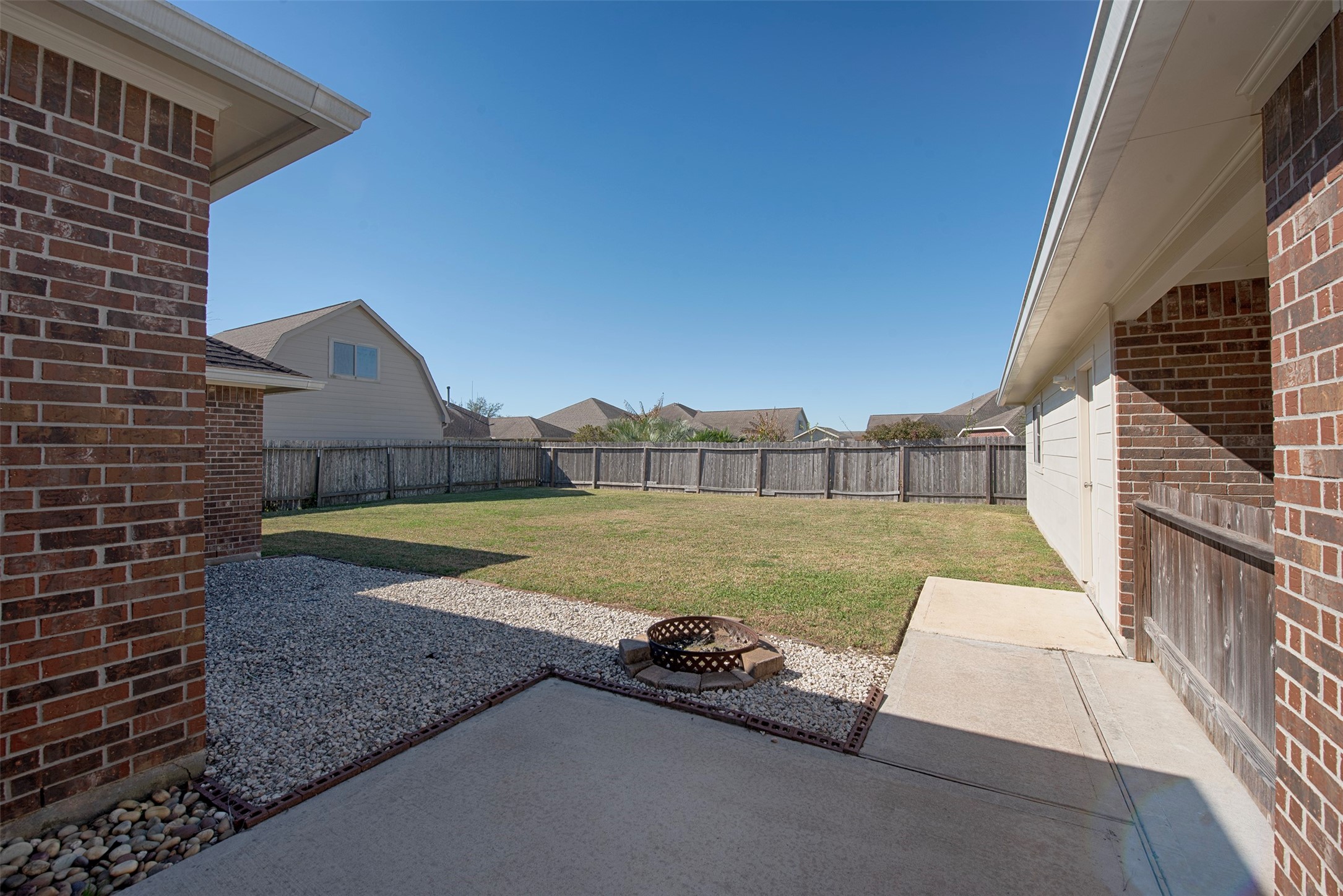 6714 Lone Star Ridge Manvel, TX 77578 - Photo 33 of 37 a view of backyard with outdoor space