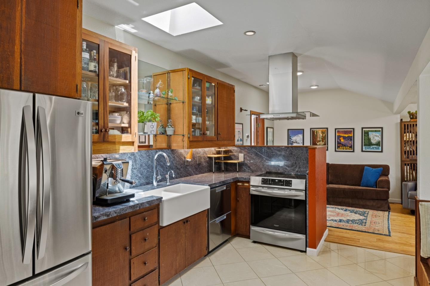 314 3rd Street Pacific Grove, CA 93950 - Photo 11 of 35 a kitchen with stainless steel appliances granite countertop a refrigerator a stove and a sink