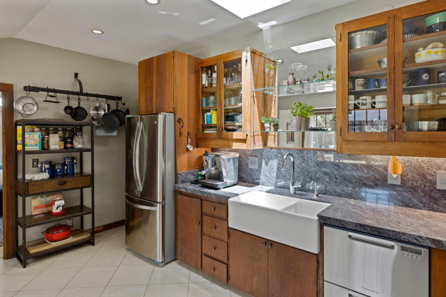 314 3rd Street Pacific Grove, CA 93950 - Photo 12 of 35 a kitchen with stainless steel appliances granite countertop a refrigerator and a sink