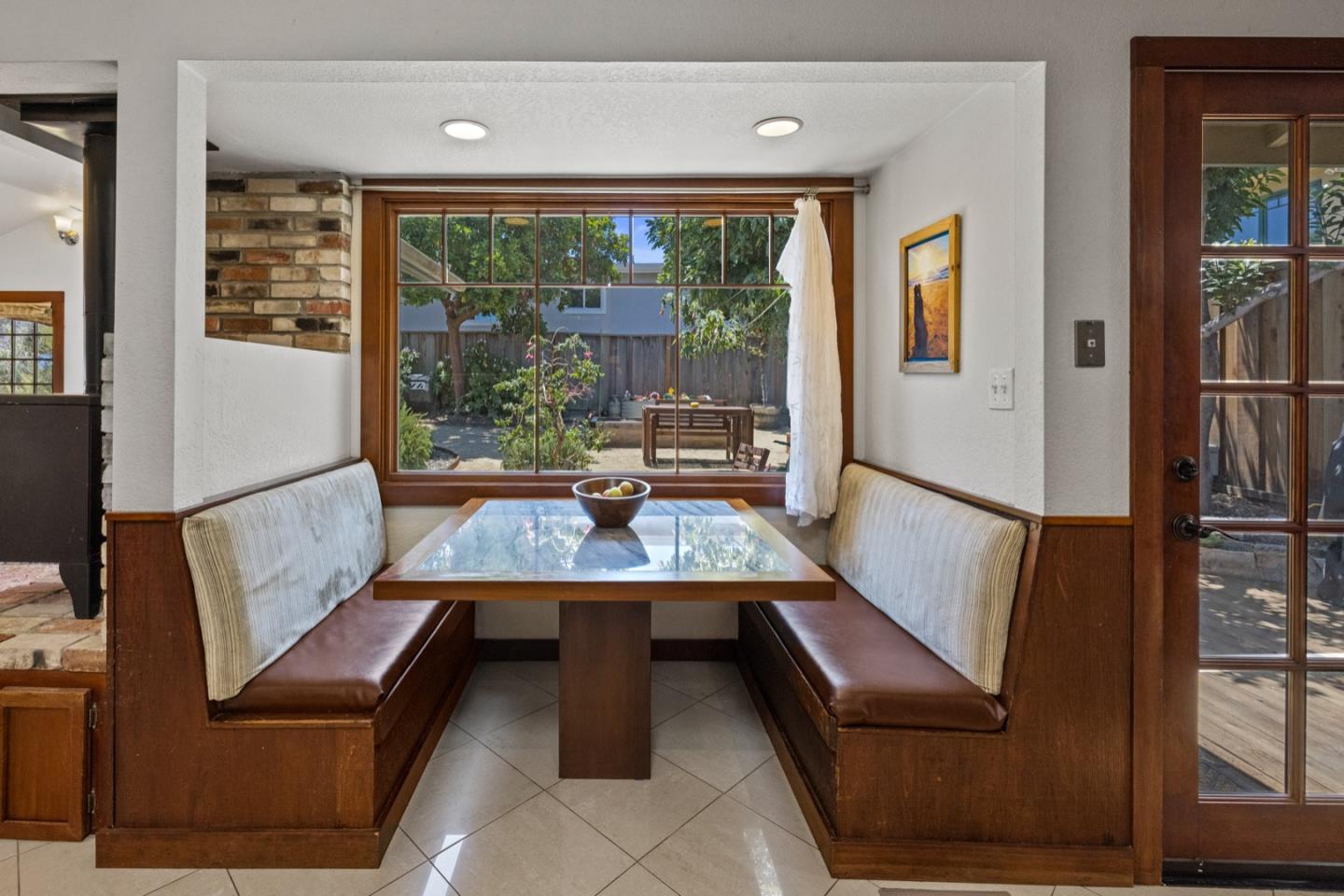 314 3rd Street Pacific Grove, CA 93950 - Photo 14 of 35 a view of a living room with furniture and a window