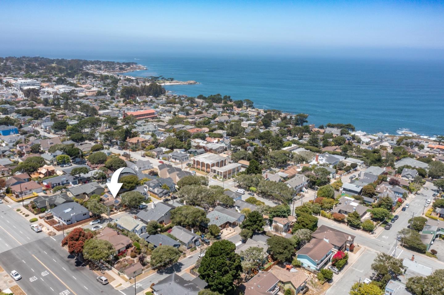 314 3rd Street Pacific Grove, CA 93950 - Photo 2 of 35 an aerial view of a city with ocean view in back