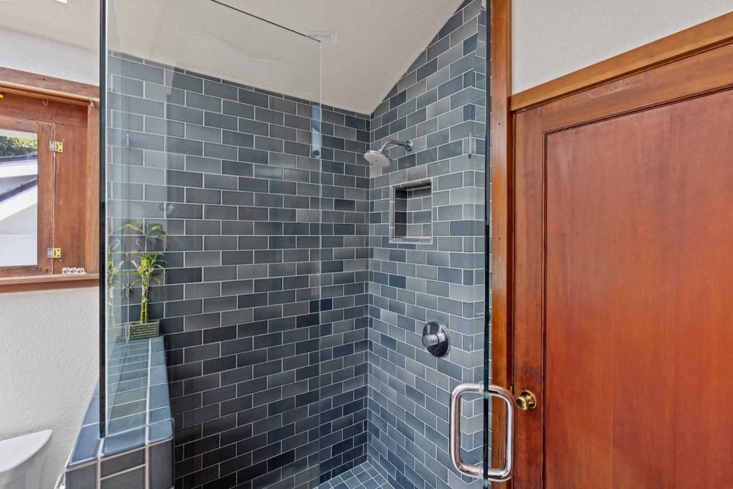314 3rd Street Pacific Grove, CA 93950 - Photo 23 of 35 a bathroom with a shower