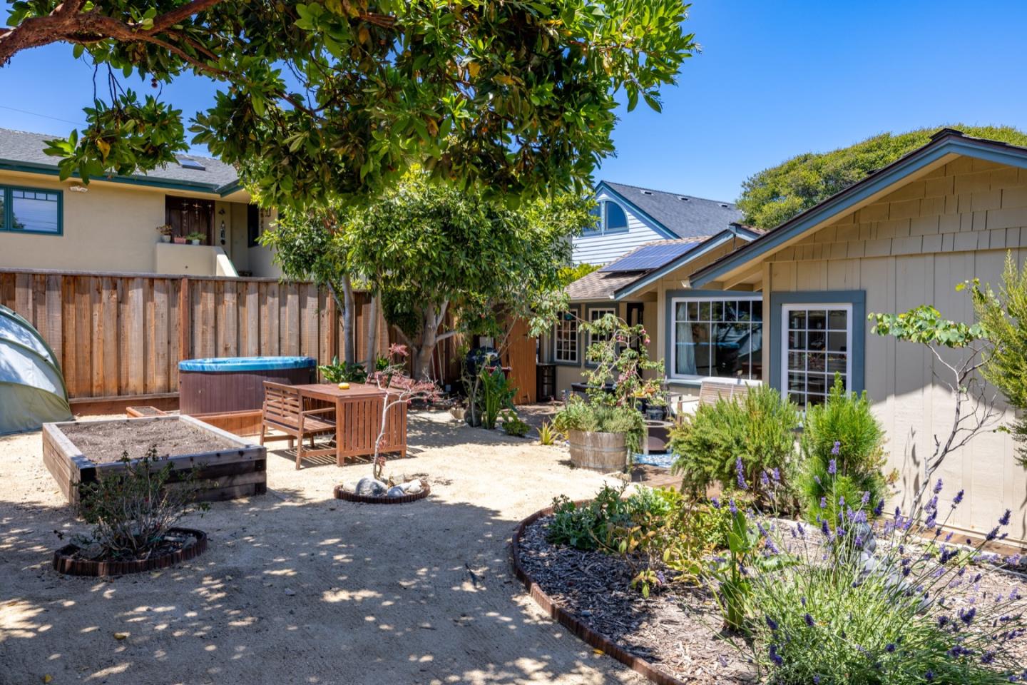 314 3rd Street Pacific Grove, CA 93950 - Photo 25 of 35 a view of backyard with outdoor seating and green space
