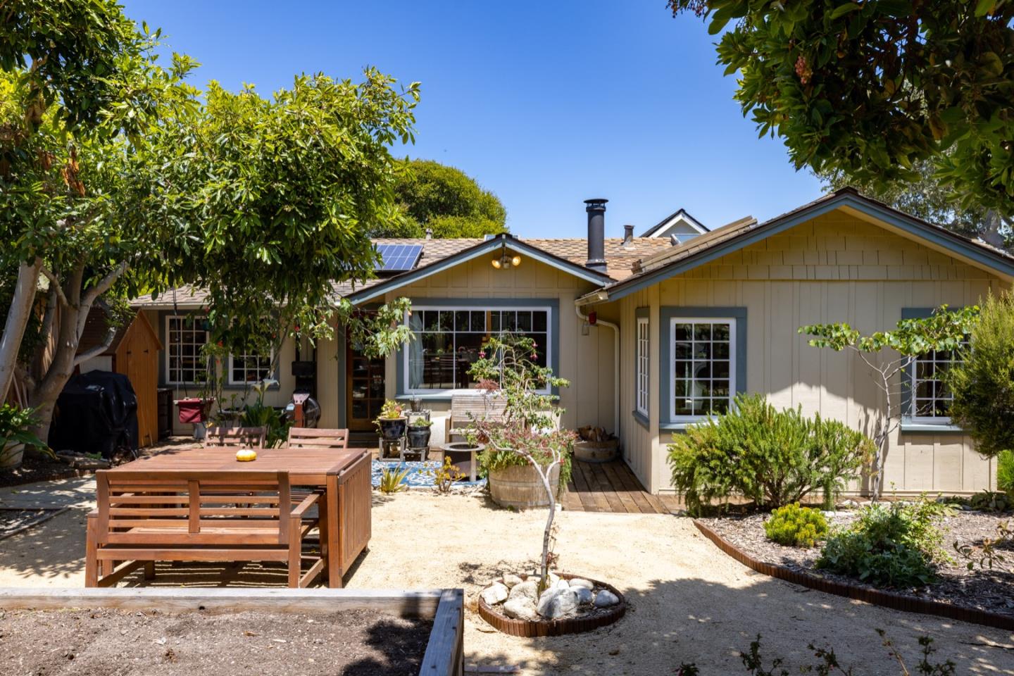 314 3rd Street Pacific Grove, CA 93950 - Photo 26 of 35 a swimming pool with outdoor seating and yard