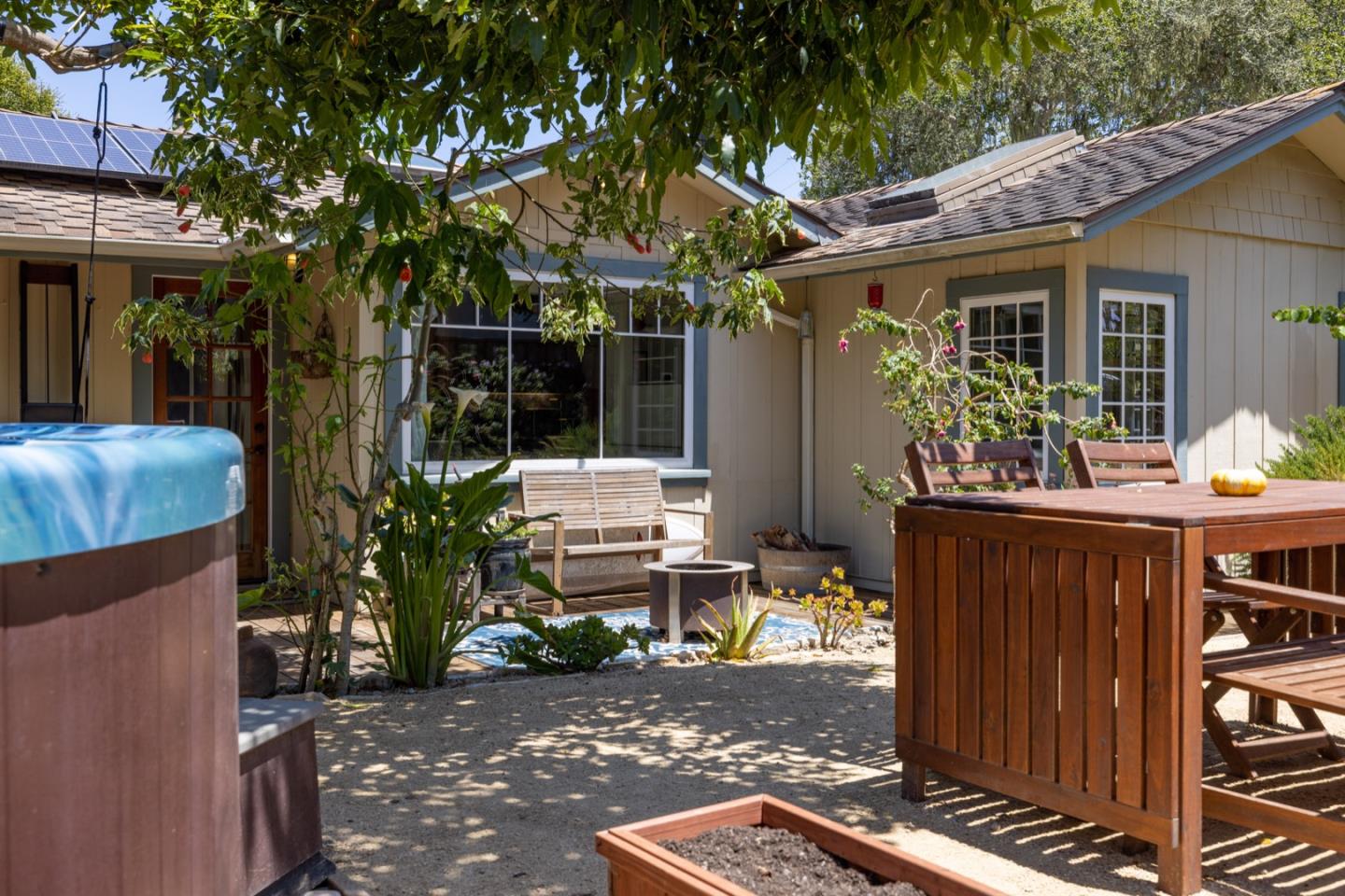 314 3rd Street Pacific Grove, CA 93950 - Photo 29 of 35 a view of a chairs and table in a patio