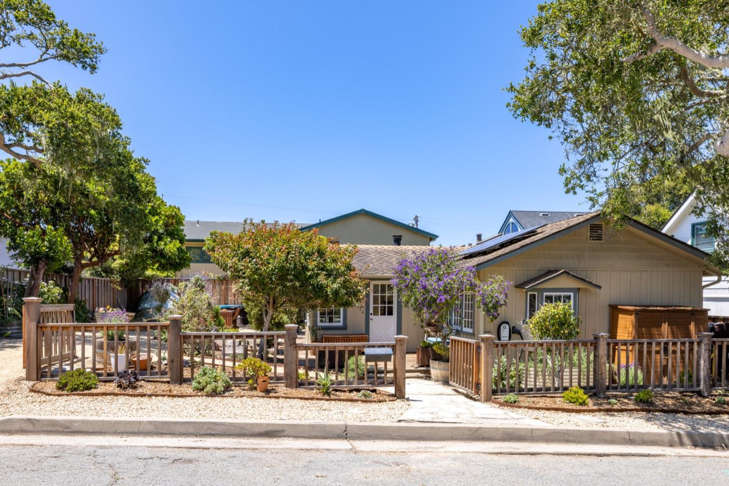 314 3rd Street Pacific Grove, CA 93950 - Photo 3 of 35 a view of a town with palm trees and plants