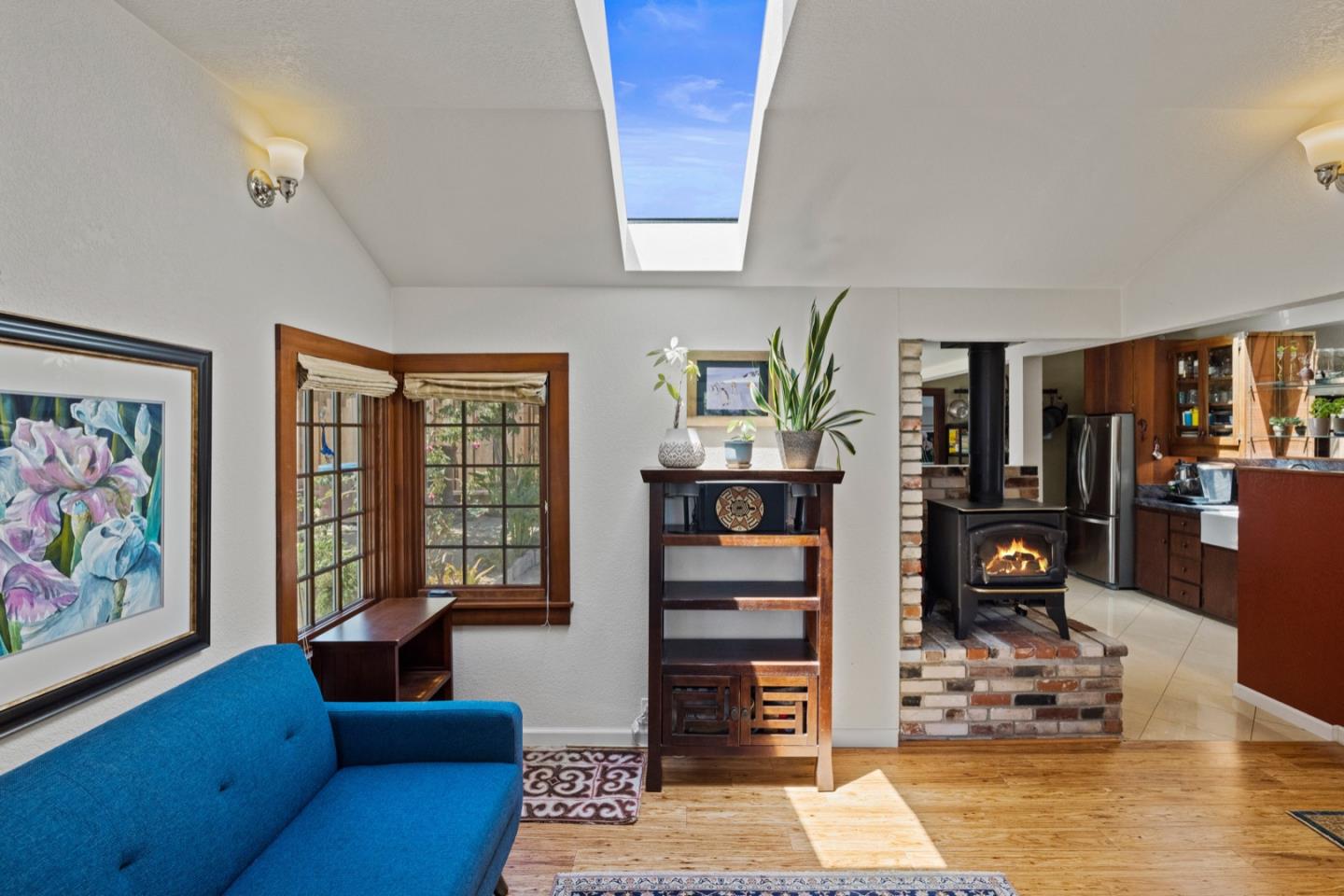 314 3rd Street Pacific Grove, CA 93950 - Photo 7 of 35 a living room with furniture and a window