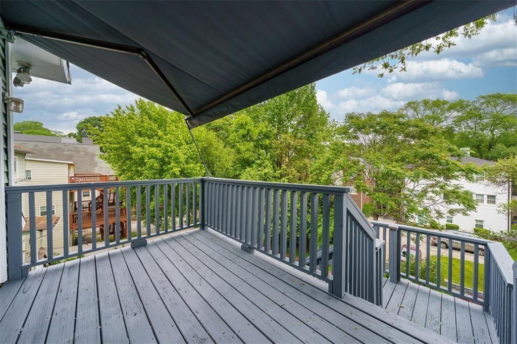 693 Myrtle Street Northeast Atlanta, GA 30308 - Photo 16 of 35 a balcony with wooden floor in outdoor space