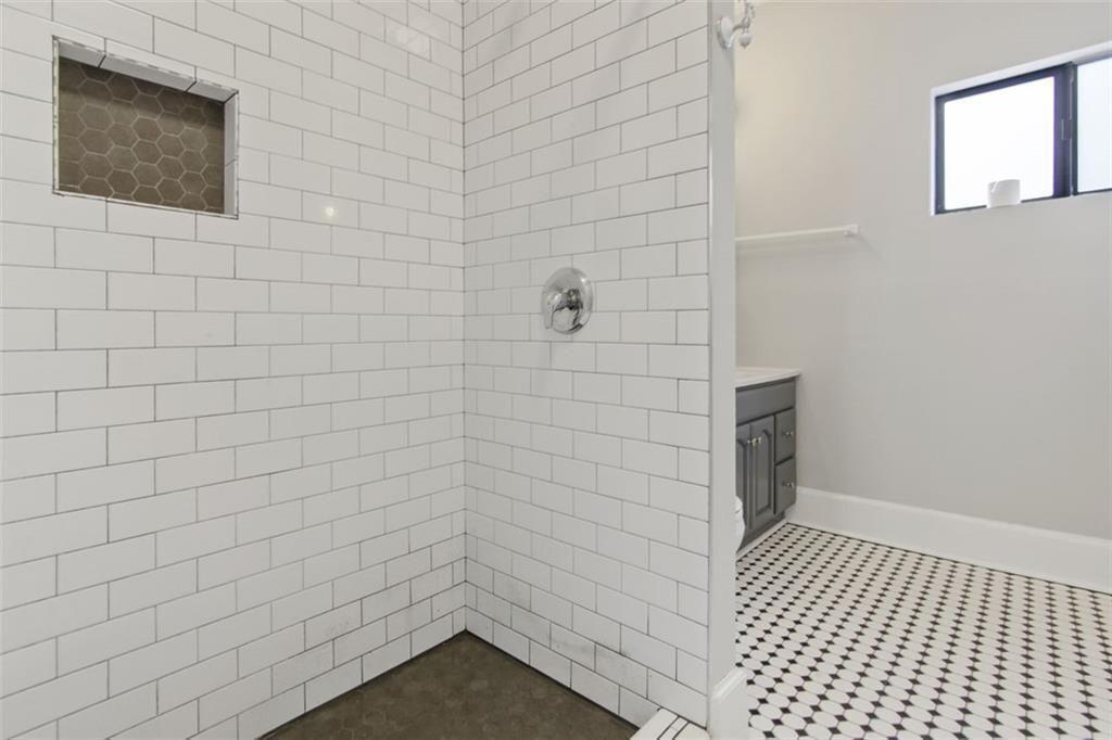 693 Myrtle Street Northeast Atlanta, GA 30308 - Photo 22 of 35 a bathroom with a shower