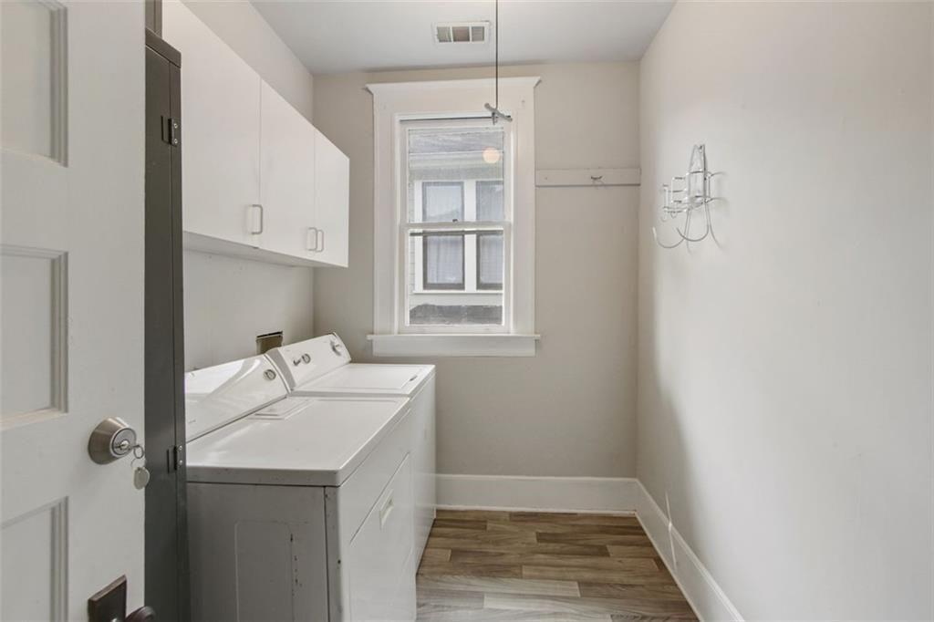 693 Myrtle Street Northeast Atlanta, GA 30308 - Photo 32 of 35 a utility room with dryer and washer